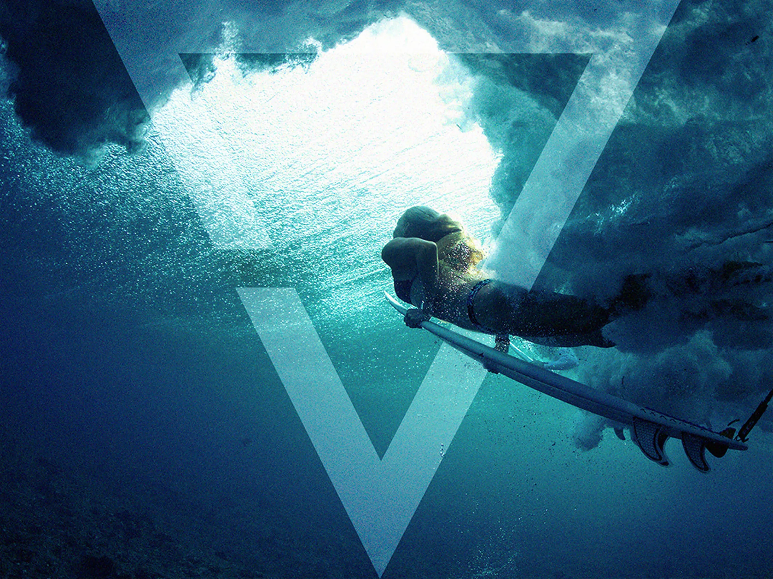 Woman surfing underwater